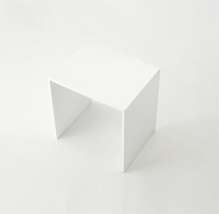 A minimalist white side table with a thin rectangular top and two straight legs, all with even thickness.